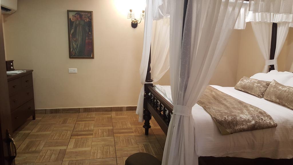 Casa Menezes - A Heritage Goan Homestay Bambolim Phòng bức ảnh